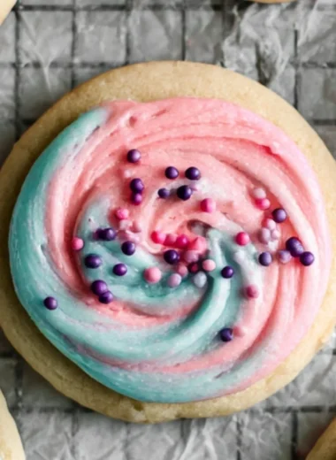 Delicious Cotton Candy Crumbl Cookies topped with colorful frosting