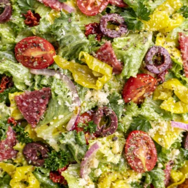 A colorful classic Italian salad with fresh vegetables and herbs.