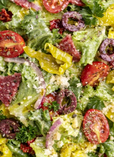 A colorful classic Italian salad with fresh vegetables and herbs.