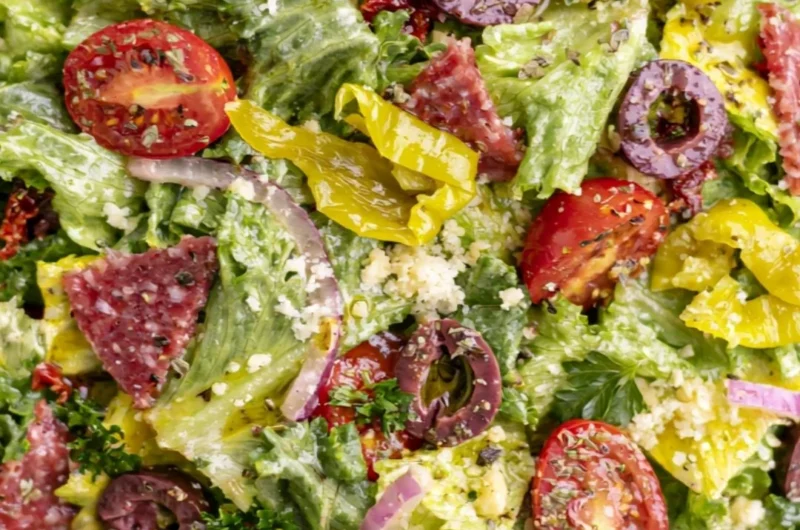 A colorful classic Italian salad with fresh vegetables and herbs.