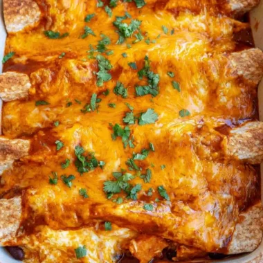 Cozy vegetarian enchiladas topped with fresh ingredients and cheese