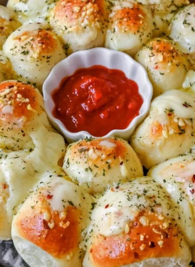 Cheesy garlic monkey bread fresh from the oven, golden and gooey.