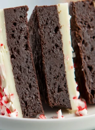 Cozy peppermint bark brownies topped with crushed peppermint candies.