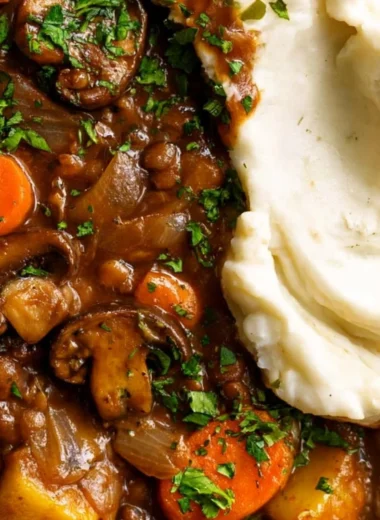 Bowl of easy one pot vegetable stew with fresh vegetables and herbs