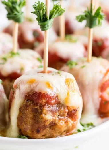 Delicious Meatball Marinara Poppers appetizer served on a platter.